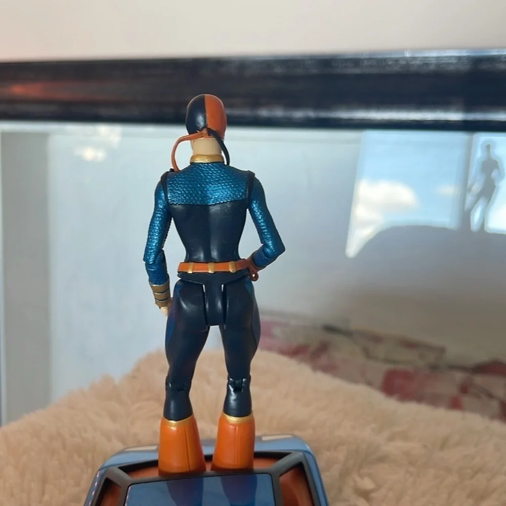 Action Figure with Orange and Blue Costume